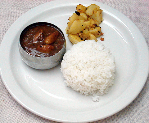 Rice with inji poondu kuzhambhu and potato curry